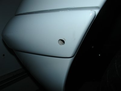 left bumper bolt bobbin hole.JPG and 